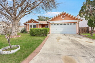 Building Photo - "Cozy 3-Bedroom Retreat with Fireplace Cha...