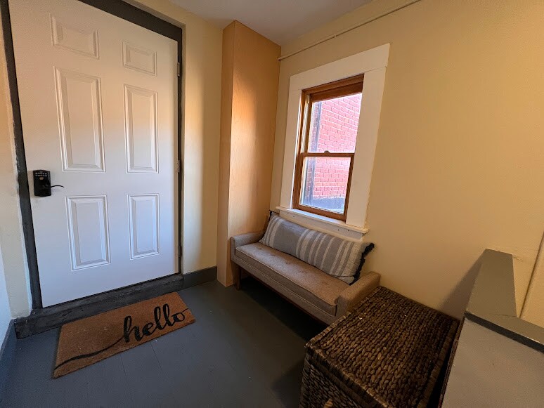Landing outside apartment door - 16 Liberty St
