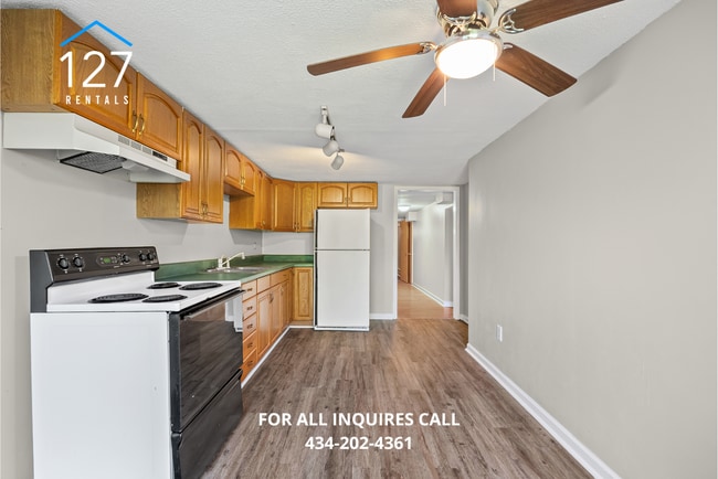 Building Photo - Spacious 4-Bedroom Home with Dual Kitchens...