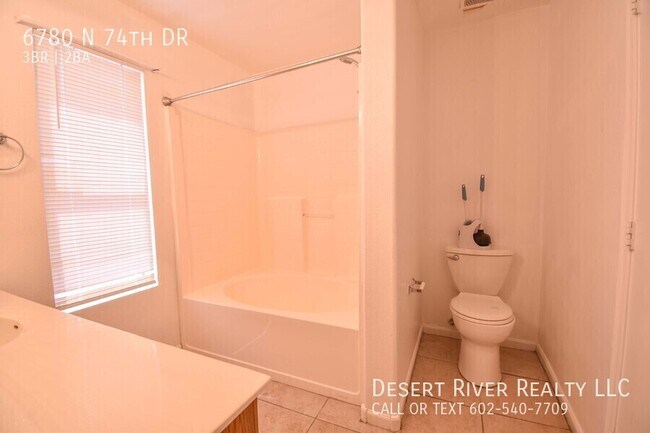 Building Photo - 6780 N 74th Dr