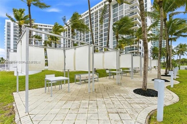 Building Photo - 10275 Collins Ave