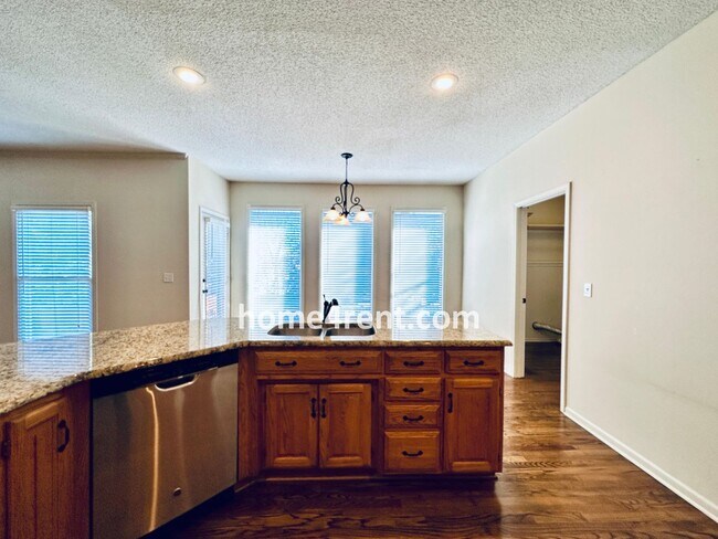 Building Photo - Blue Valley Northwest home on a cul-de-sac w/ granite counters, ss appliances and fenced yard!