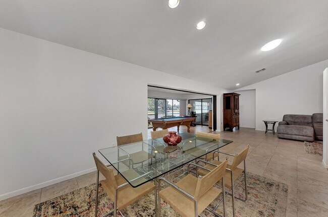 Building Photo - BEAUTIFUL 2 BEDROOM 2 BATHROOM + A DEN VILLA WITH GORGEOUS LAKE VIEWS!