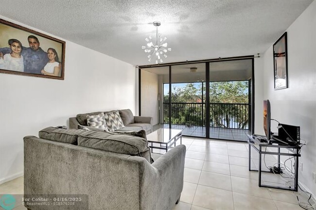 Building Photo - 8592 W Sunrise Blvd