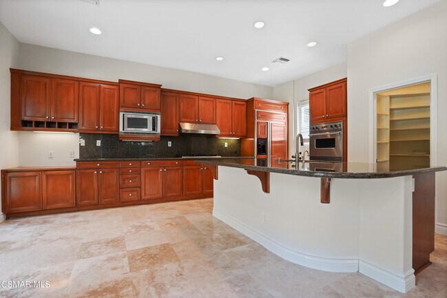 Building Photo - 6077 Mandeville Pl