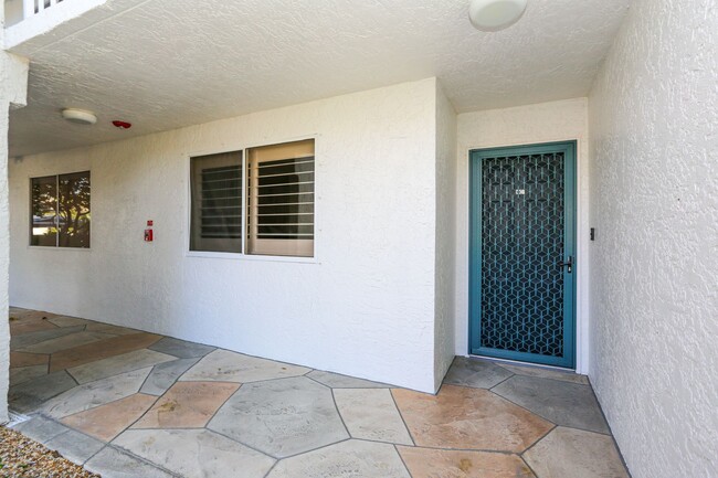 Building Photo - Live the Naples Lifestyle – Elegant 2BR/2B...