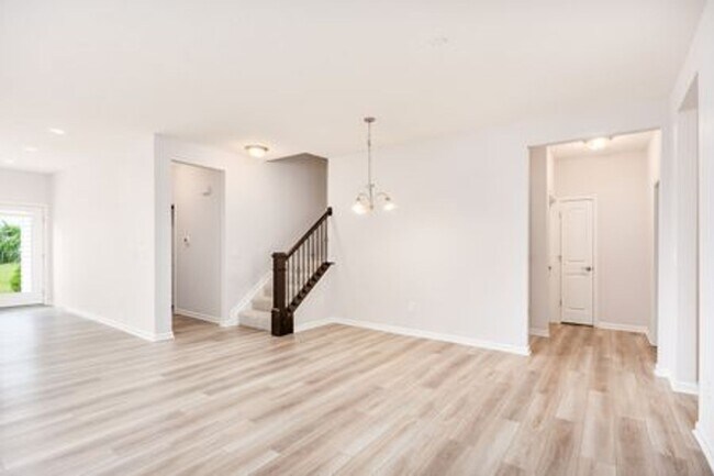 Building Photo - Updated 3-Bedroom Home with 3 Baths, Open-Concept Layout, Luxury Flooring & Bright Modern Kitchen