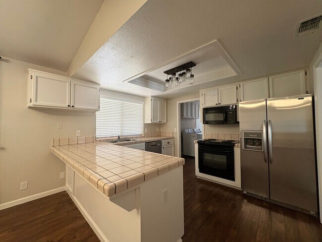 Building Photo - Your Private Escape – Charming Ranch-Style Home with Room to Breathe!