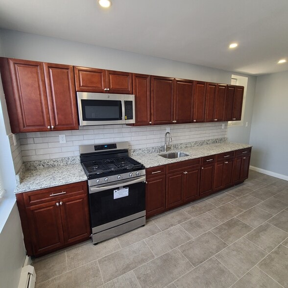 Renovated Kitchen - 6117 Monitor Plz