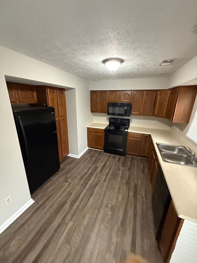 Building Photo - Located in Georgetown, KY, three-bedroom, 2.5-bath townhouse