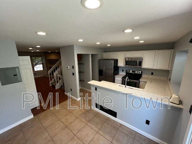 Building Photo - 9673 W Chatfield Ave