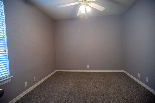 Building Photo - "Spacious 4-Bed Home with Granite Touch & ...