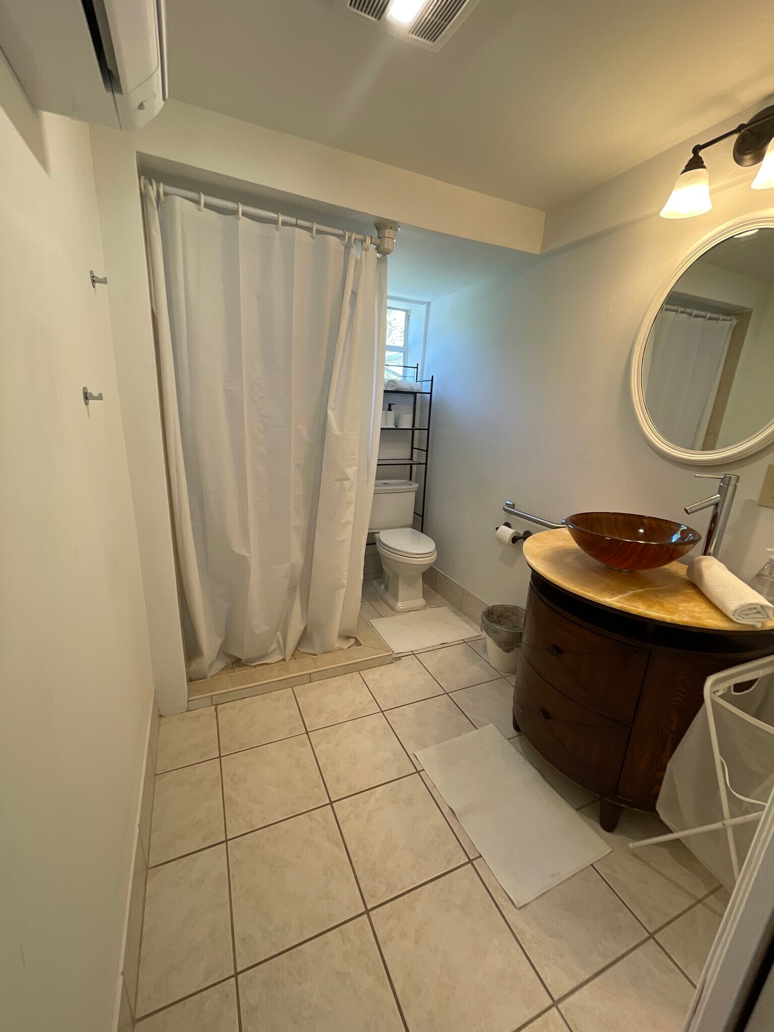 Bathroom with walk in shower ac in the room - 2440 Manasota Beach Rd