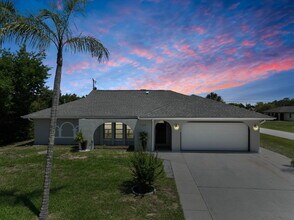 Building Photo - “Spacious 3-Bed Retreat with Granite Elega...