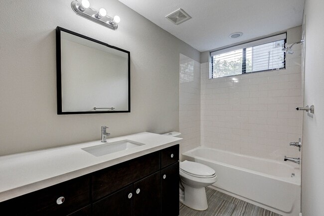 Building Photo - Modern Comfort Meets City Living — 3-Story Townhome Ready Now!