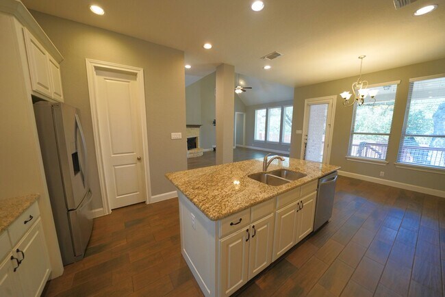 Building Photo - Executive Style Rental Now Available in Bo...