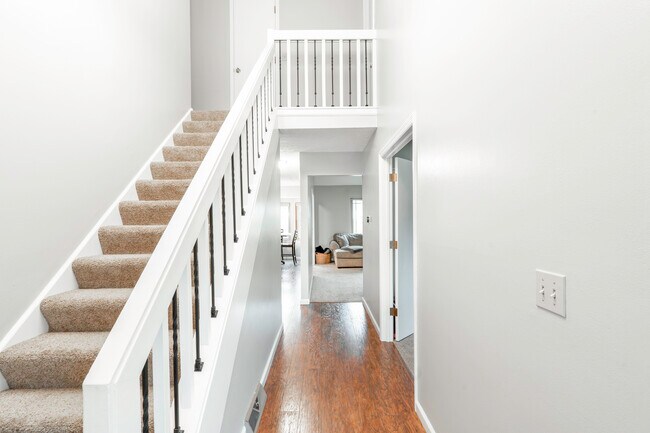 Staircase leading to 2 additional bedrooms - 67 Groton Dr