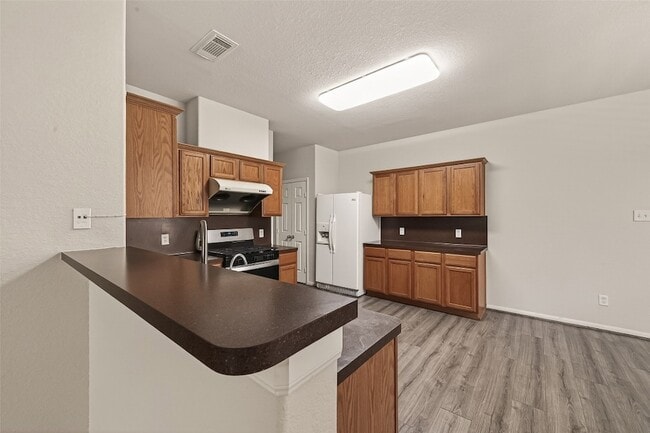 Building Photo - 13915 Maleewan Ln