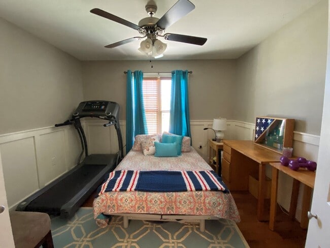 Building Photo - FENCED BACKYARD! BONUS ROOM/OFFICE! SAFE ROOM! THREE CAR GARAGE