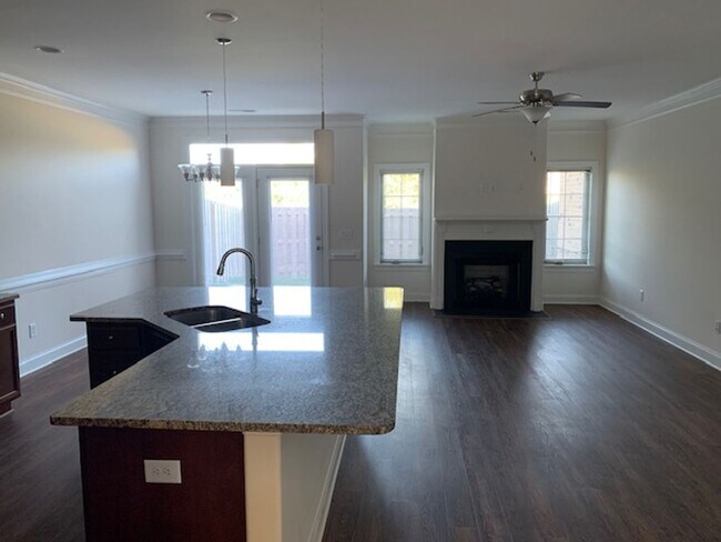 Building Photo - Stunning Brick Townhome with Garage in Tre...