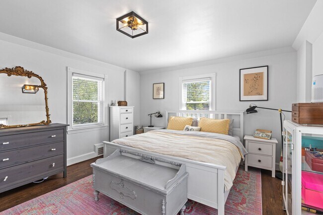 Building Photo - Luxurious Brick Colonial in Prestigious Gu...
