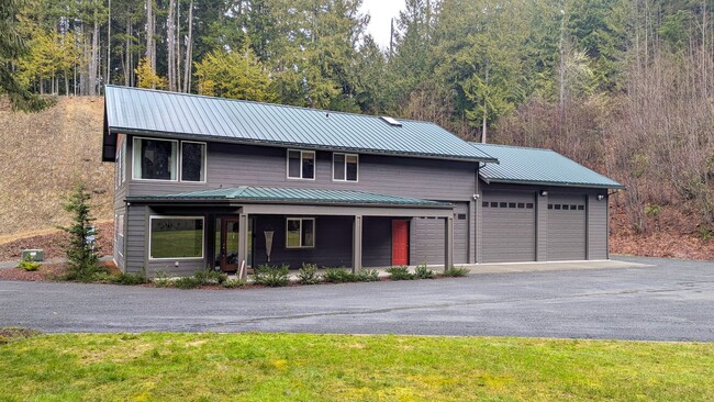 Primary Photo - Custom home in the woods, where critters r...