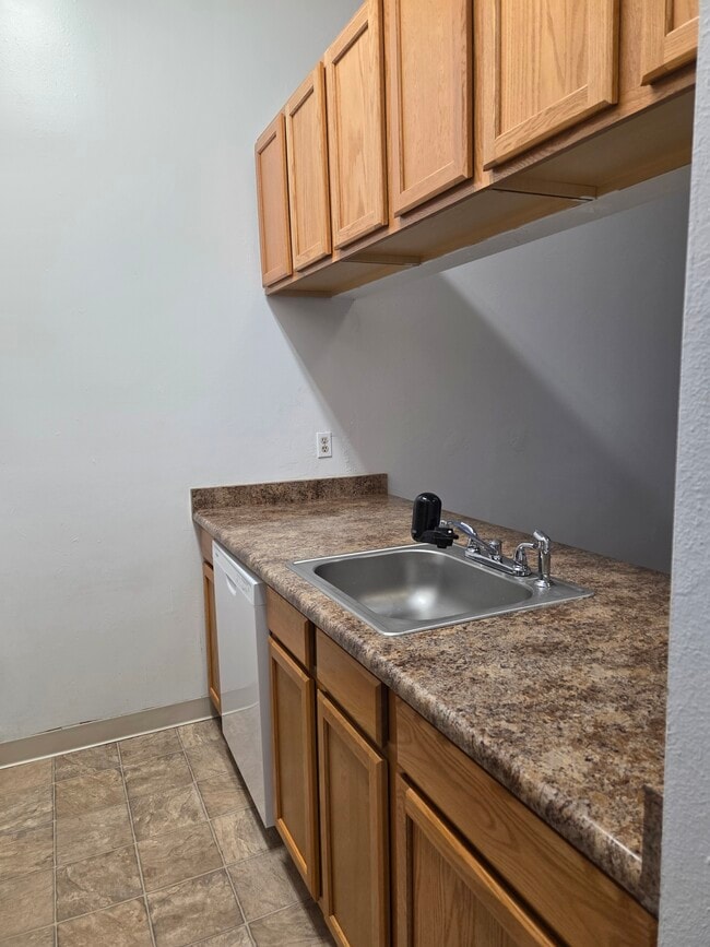 Building Photo - Stonecreek Park Condominiums