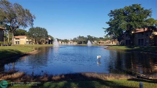 Building Photo - 4759 Via Palm Lakes