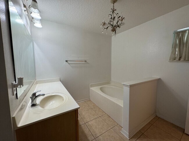 Building Photo - Available Now! Spacious 4-Bedroom, 2-Bath ...