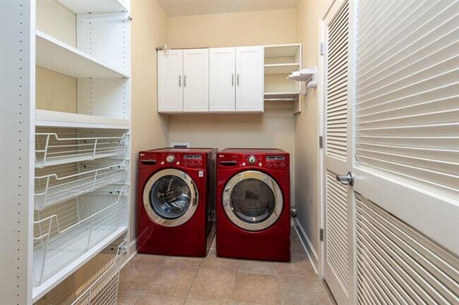 Building Photo - Gorgeous two bedroom two bath with 1574 ft.² two parking spaces included balcony, beautiful rooft...