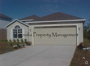 Building Photo - New Paint, Floors and Solid Surface Counte...
