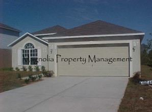 Building Photo - New Paint, Floors and Solid Surface Counte...