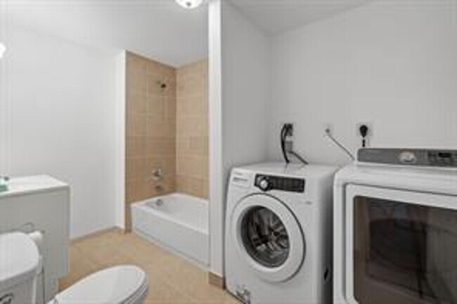 Building Photo - Spacious 5-Bed Walkout Home with Over 3,50...