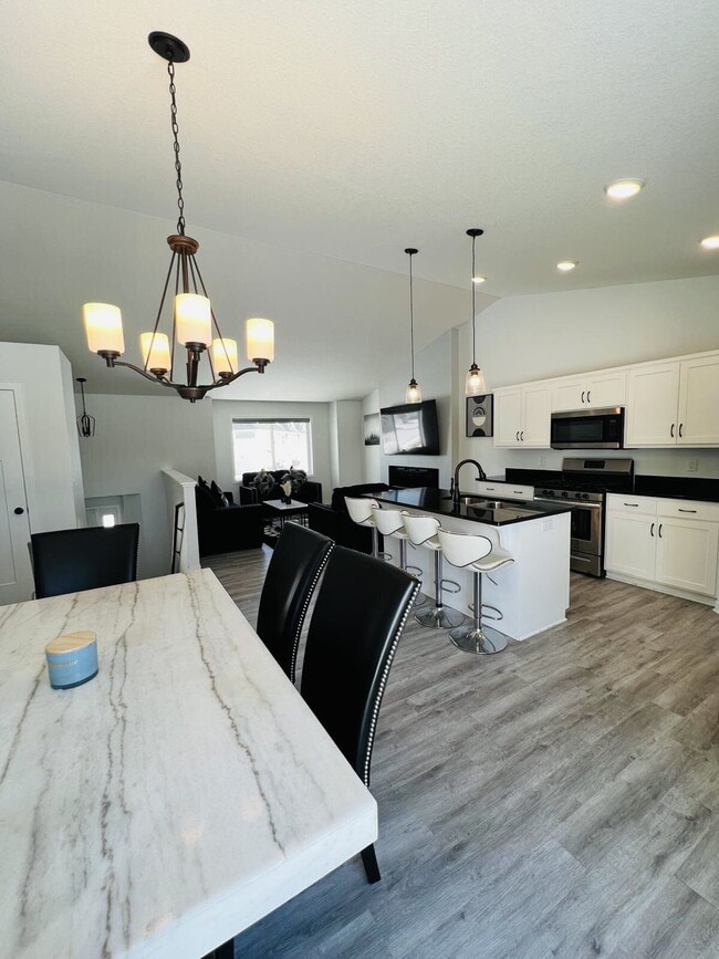 Building Photo - Newer Development Home Spacious 4-Bedroom 3 Bathroom Single Family Home with Finished Basement in...