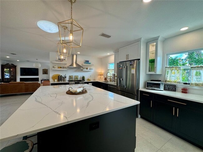 Building Photo - 7372 Melaleuca Way