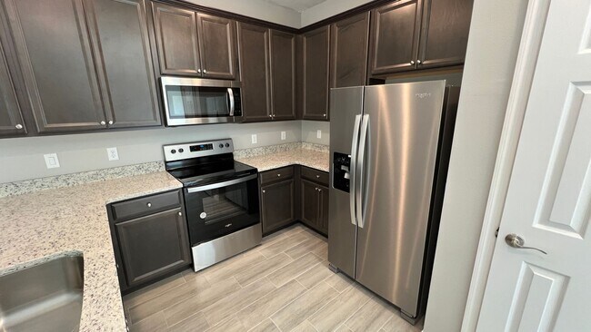 Building Photo - Smart & Stylish 3BD/2BA Palm Bay Home – Modern Upgrades, No Water Bills!