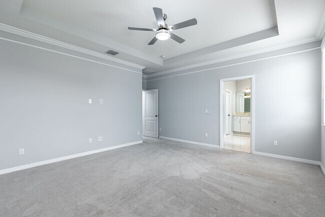 Building Photo - PRATICALLY BRAND NEW HOME IN GATED COMMUNITY!