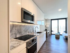 Building Photo - STUDIO/1BA/1PRKG at Aalii Ward Village.
