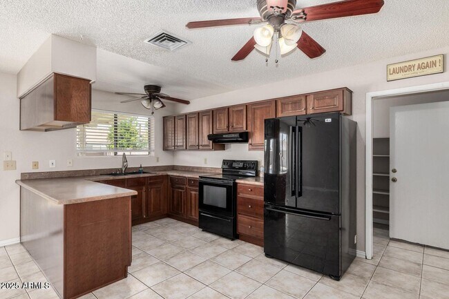 Building Photo - 2361 E Capri Ave