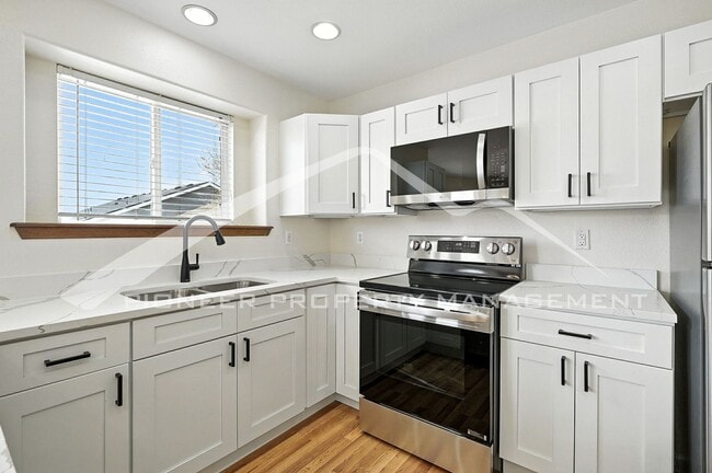 Building Photo - Charming Home with Central AC and Gas Fire...