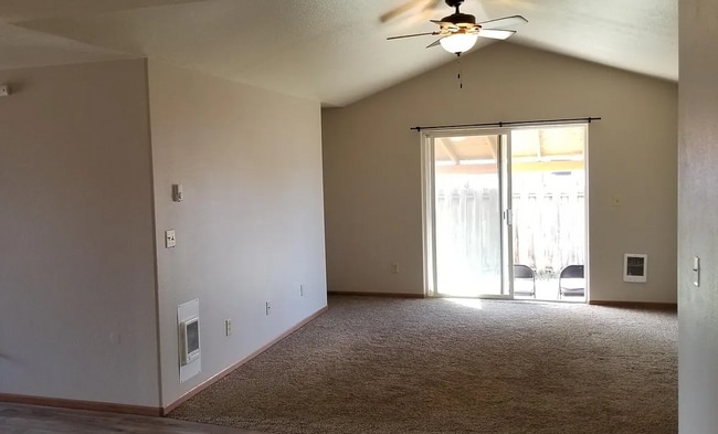 Building Photo - 3 Bed Home with Covered Patio & Fenced Yard!