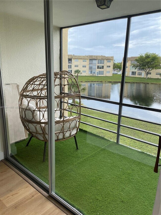 Building Photo - 8465 Sunrise Lakes Blvd