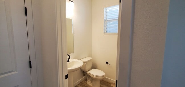 Building Photo - Beautifully designed modern townhome with attached garage.