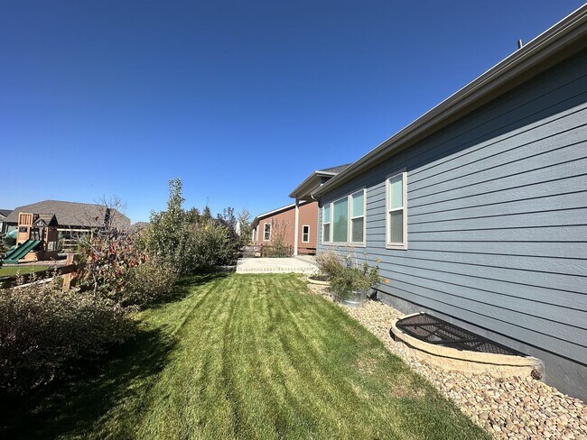 Building Photo - Modern 4-Bed Ranch in Erie with 13-Ft Ceilings, Solar Panels & EV Charger