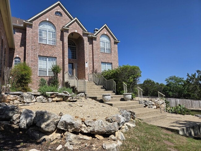 Building Photo - *COMING SOON* Luxurious 2-Story Home in Gated Stone Oak Community – Pool & Lawn Care Included