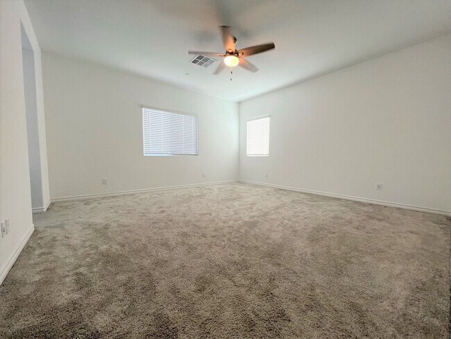 Building Photo - 4 BEDROOMS, 2.5 BATHS AT VILLIAGES AT TULE...