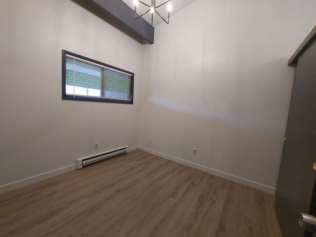Building Photo - North Seattle 1BR with Private Balcony, Natural Light, and Modern Flooring