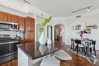 Building Photo - City Living with a Touch of Luxury!