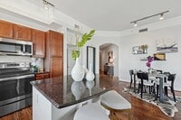Building Photo - City Living with a Touch of Luxury!