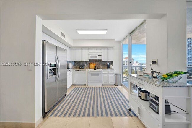 Building Photo - 6301 Collins Ave